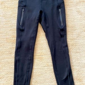 Athleta fleece-lined leggings. XS Petite. Two flattering zippered thigh pockets.